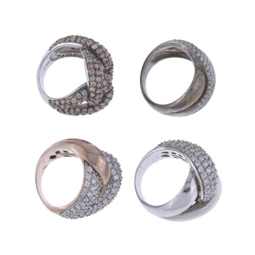 FOUR RHINESTONES RINGS.