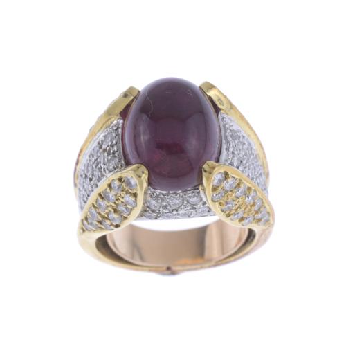 BICOLOUR PYRAMID-SHAPED RING WITH CABOCHON TOURMALINE.