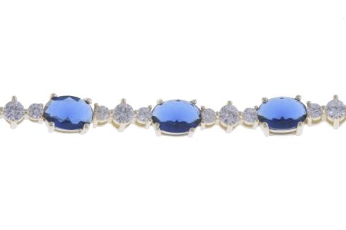 PULSERA RIVIÉRE CON TOPACIOS AZULES.