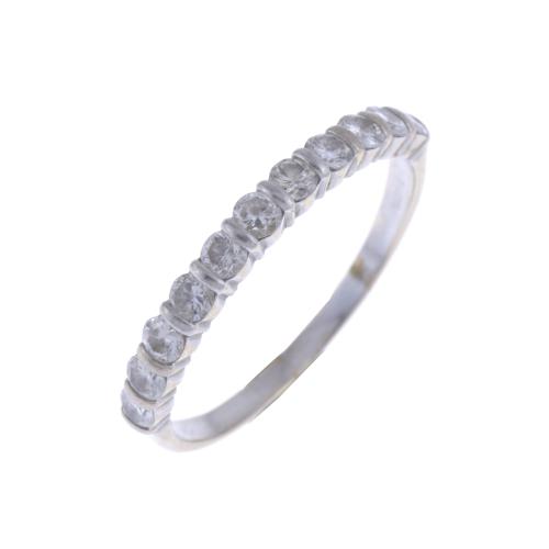 HALF WEDDING RING IN WHITE GOLD AND DIAMONDS.