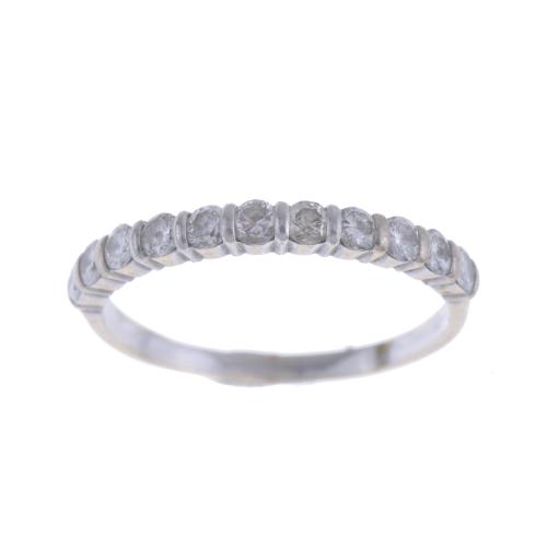 HALF WEDDING RING IN WHITE GOLD AND DIAMONDS.