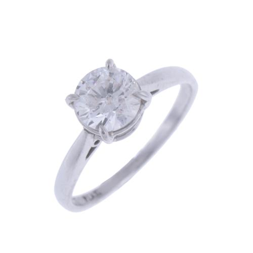 GOLD AND DIAMOND SOLITAIRE RING