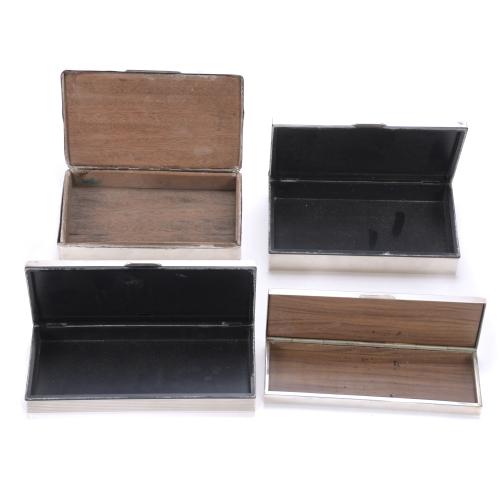 CONJUNTO DE CUATRO CAJAS TABAQUERAS DE PLATA. 