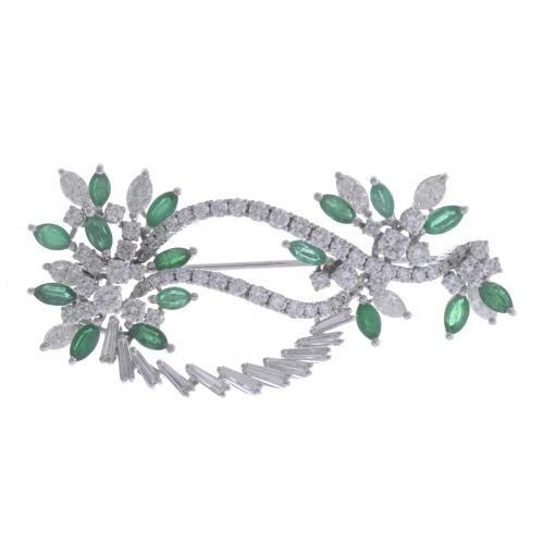 DIAMONDS AND EMERALDS BROOCH, 1970'S.