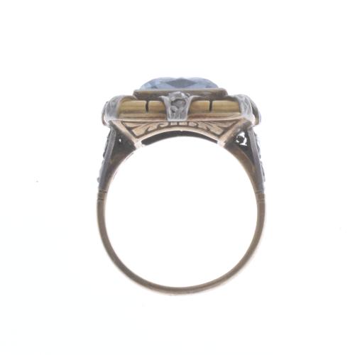 NOUCENTISTA RING WITH A LARGE CENTRAL AQUAMARINE AND DIAMON