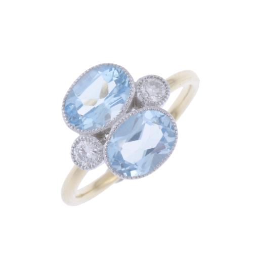 ART DECO STYLE RING WITH BLUE TOPAZES AND DIAMONDS