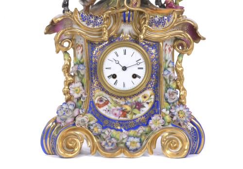 AFTER MODELS BY JACOB PETIT (1796-1868). TABLE CLOCK IN POR