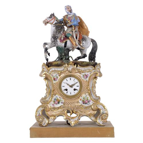 AFTER MODELS BY JACOB PETIT (1796-1868). PARIS PORCELAIN TABLE CLOCK, LOUIS PHILIPPE PERIOD, CIRCA 1840.