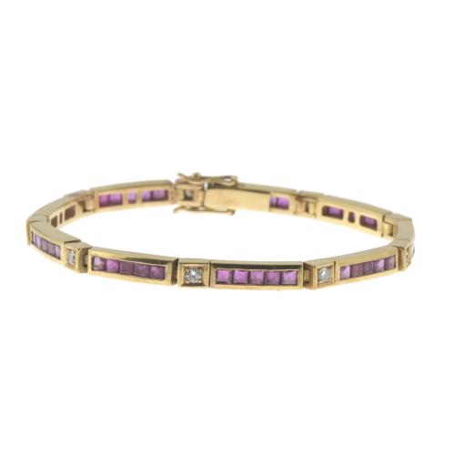 SEMI-ARTICULATED BRACELET IN GOLD WITH RUBIES AND DIAMONDS