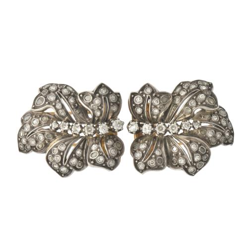 Pair of floral brooches with diamonds, circa 1920.