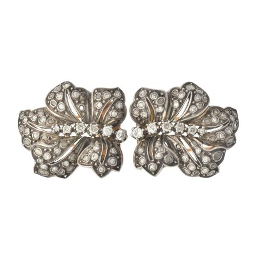 Pair of floral brooches with diamonds, circa 1920.