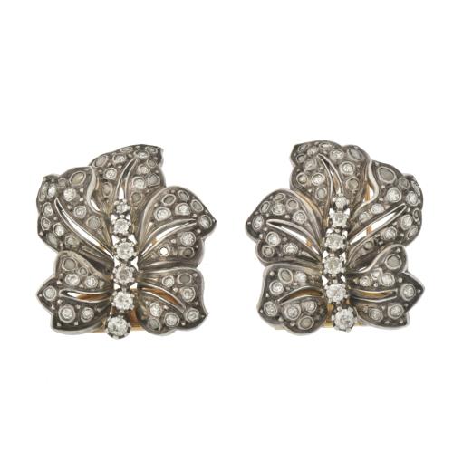 Pair of floral brooches with diamonds, circa 1920.