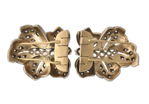 Pair of floral brooches with diamonds, circa 1920.