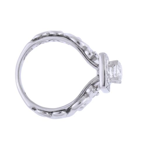 Square rosette ring with diamonds.