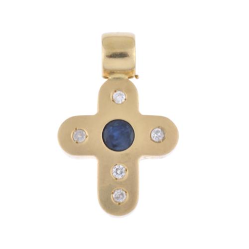 Cross-shaped pendant with onyx and diamonds.