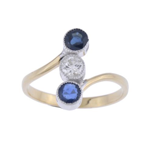 Art Deco style shuttle ring with sapphires and diamonds.