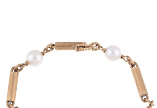 Pearls and gold bracelet.