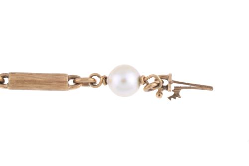 Pearls and gold bracelet.