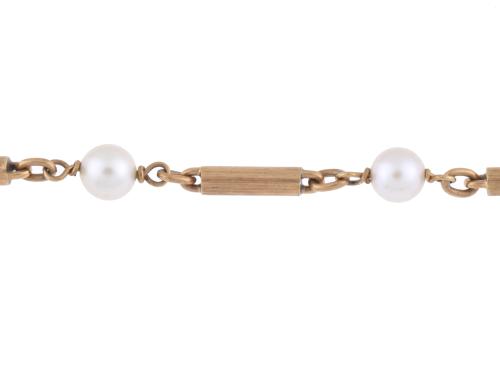 Pearls and gold bracelet.