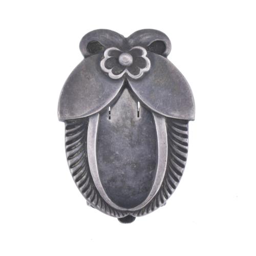 GEORG JENSEN. 'Leaves and flower' brooch.