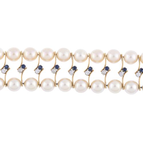 Two-row pearls bracelet with sapphires and diamonds.