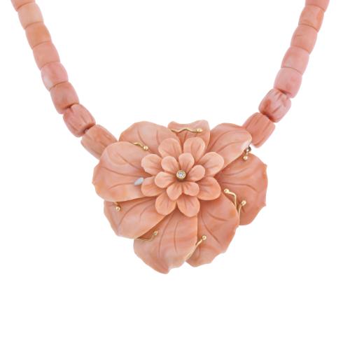 Floral necklace in angel skin coral and gold.