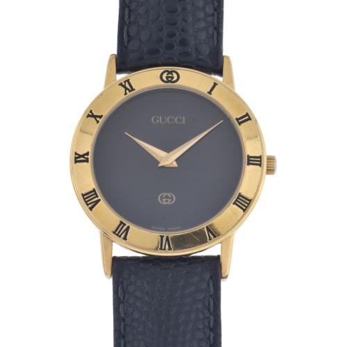 'GUCCI' wristwatch.