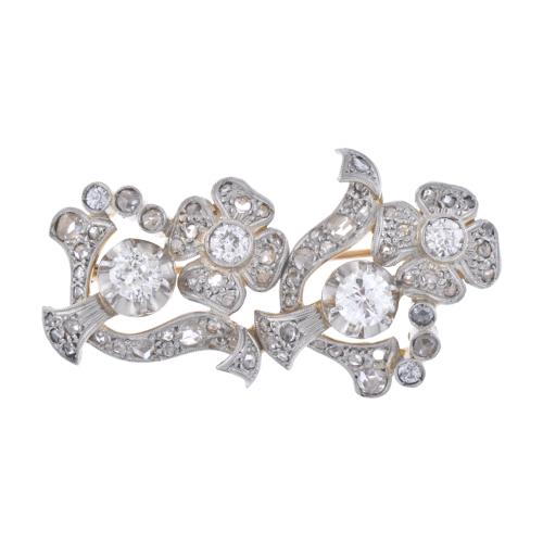 Diamonds floral brooch.