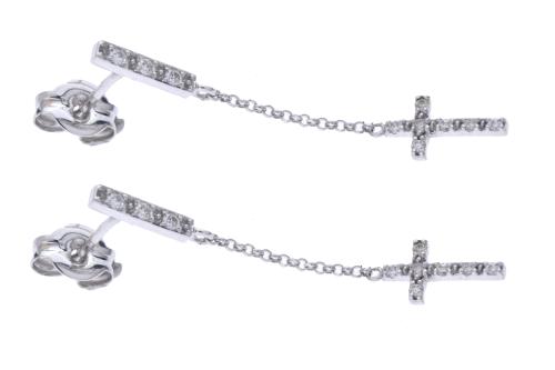 Diamonds earrings with pendant crosses.