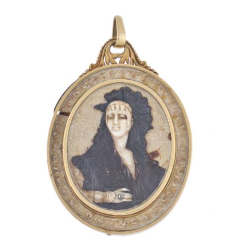 Belle Époque pendant, with bas-relief of a woman wearing a shawl.